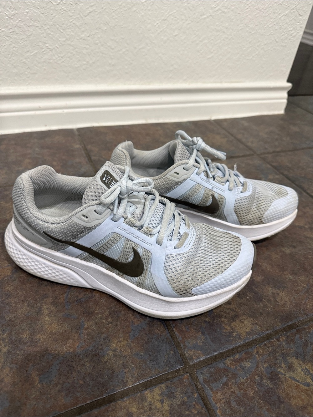 Nike Women’s Light Gray and Blue Athletic Shoes